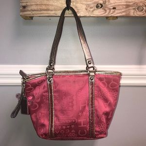 Pink and silver coach purse
